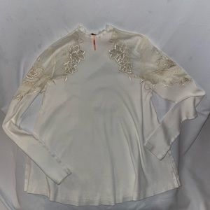 Small FREE PEOPLE cream lace cutouts top long sleeve